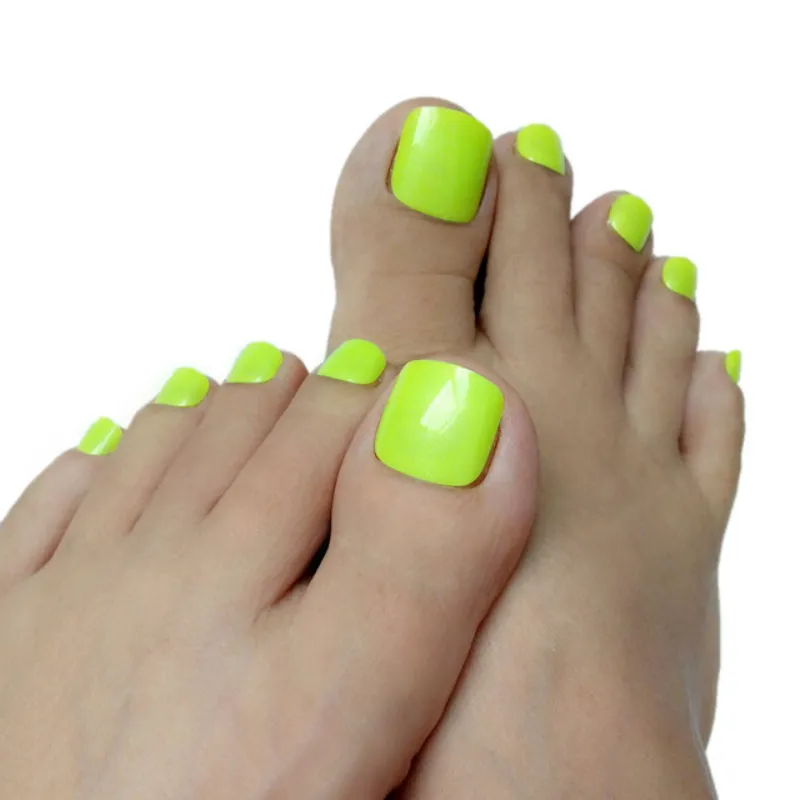 Uñas de los pies color amarillo neon